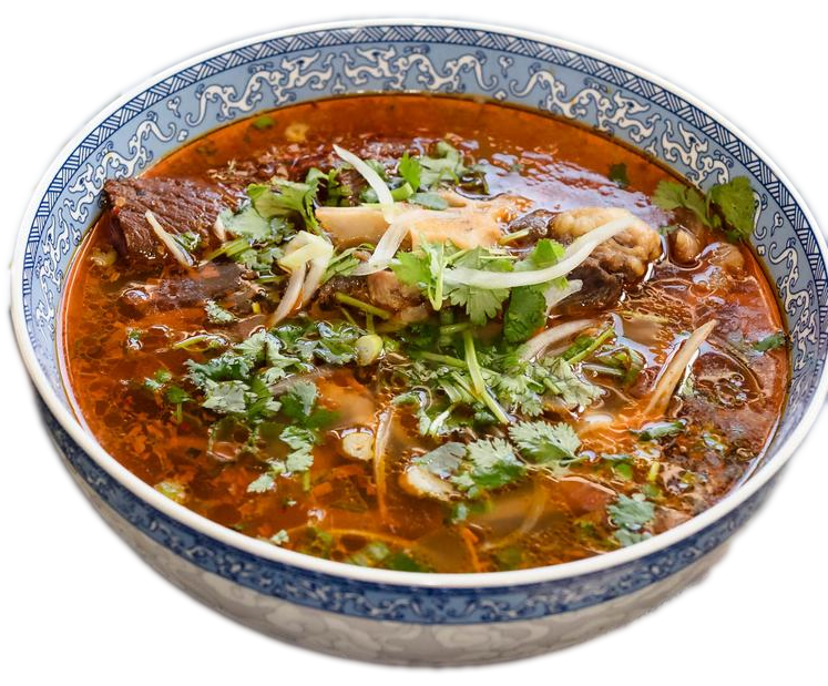 Large bowl of Beef Pho with basil and lime at Pho Fresh.